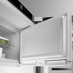 Door hinge exchange, integrated freezer compartment